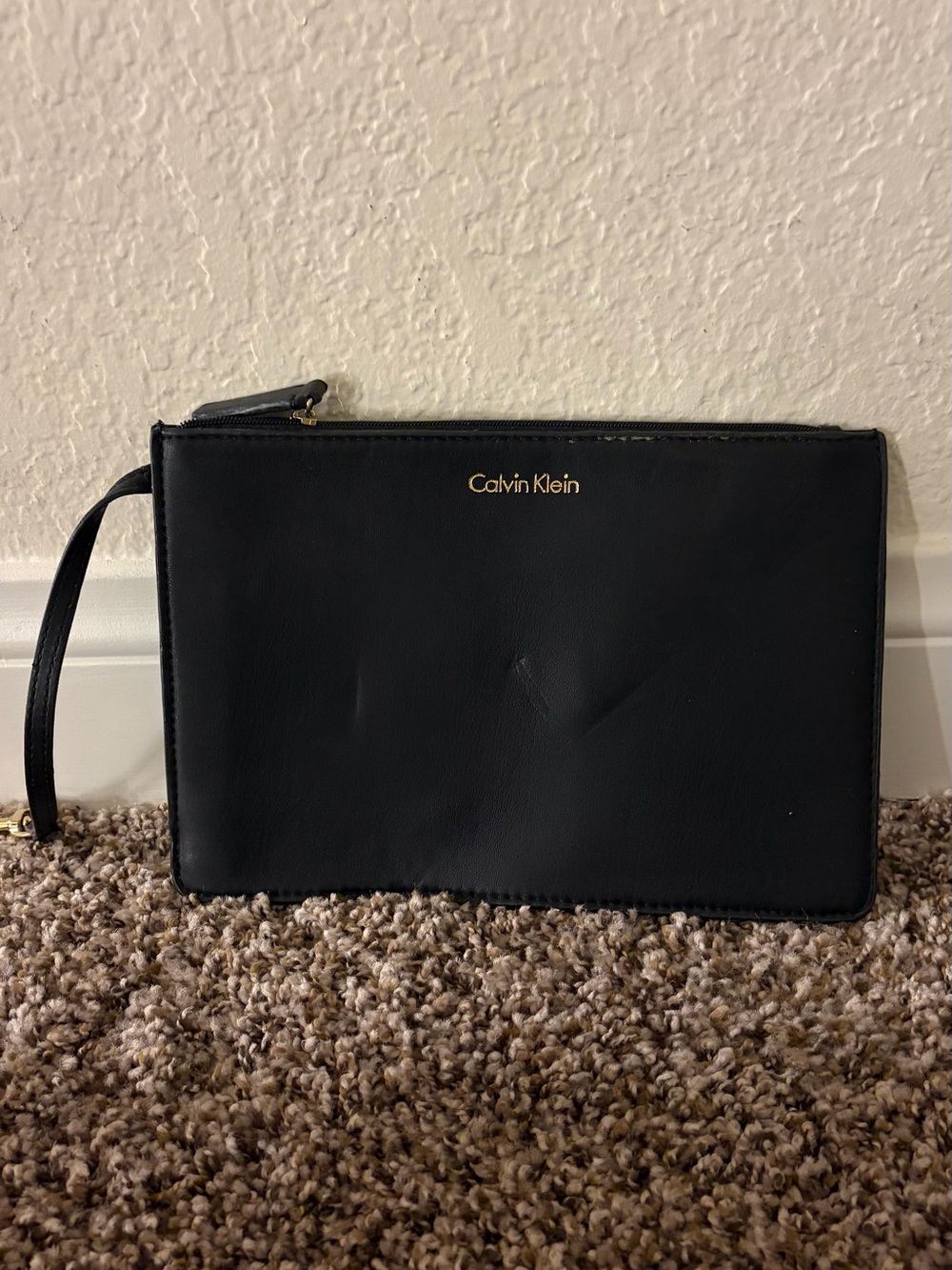 Calvin Klein Black Leather Wristlet Pouch with Gold Logo